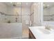 Bright bathroom featuring tiled walls, dual shower heads, and modern fixtures at 19650 Harbor Watch Ct, Lancaster, SC 29720