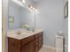 Bathroom featuring double sink vanity, white countertop, and decorative accents at 19650 Harbor Watch Ct, Lancaster, SC 29720