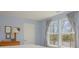 Bedroom with natural light from two windows and calming blue walls at 19650 Harbor Watch Ct, Lancaster, SC 29720