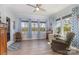 Well-lit bedroom with water views and blue accent decor at 19650 Harbor Watch Ct, Lancaster, SC 29720