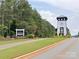 Edgewater community entrance with a lighthouse and landscaped grounds creates a welcoming arrival at 19650 Harbor Watch Ct, Lancaster, SC 29720
