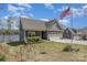 This is a two-story home with a traditional exterior, attached garage, and well-maintained yard at 19650 Harbor Watch Ct, Lancaster, SC 29720