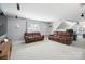 Spacious basement with a media area and comfortable leather seating for entertainment at 202 Weeping Spring Dr, Mooresville, NC 28115