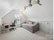 Bright bedroom featuring a ceiling fan and natural light with a daybed at 202 Weeping Spring Dr, Mooresville, NC 28115