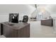 An upstairs home office with natural light, a day bed, and desk at 202 Weeping Spring Dr, Mooresville, NC 28115