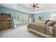 Cozy main bedroom with natural light, neutral color scheme, and ample closet space at 202 Weeping Spring Dr, Mooresville, NC 28115