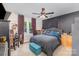 Spacious main bedroom features dark accent wall, large window, ceiling fan, and neutral carpet at 206 Friedheim Rd, Rock Hill, SC 29730