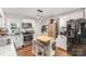 Bright kitchen features stainless steel appliances, white cabinets, and a center island with breakfast bar at 206 Friedheim Rd, Rock Hill, SC 29730
