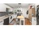 Bright kitchen features white cabinetry, island, and stainless steel appliances at 206 Friedheim Rd, Rock Hill, SC 29730