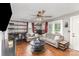 Bright living room featuring two sofas, wood floors, and neutral tones at 206 Friedheim Rd, Rock Hill, SC 29730