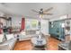 Inviting living room showcasing a ceiling fan, gray sofas, and hardwood floors at 206 Friedheim Rd, Rock Hill, SC 29730