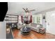 Light-filled living room showcases hardwood floors and modern decor at 206 Friedheim Rd, Rock Hill, SC 29730