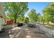 Lovely outdoor back deck features a dining set, grill, and ample room for entertaining at 2115 Fowler Secrest Rd, Monroe, NC 28110