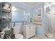 Inviting bathroom features tile flooring, a single sink vanity, and a shower/tub combo at 2115 Fowler Secrest Rd, Monroe, NC 28110