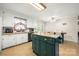 Open floor plan features combined kitchen and eating area and includes a movable center island at 2115 Fowler Secrest Rd, Monroe, NC 28110