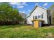 The expansive backyard features a shed and offers ample room for outdoor activities and relaxation at 221 N Davis Ave, Newton, NC 28658