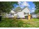 Rear view of house showing storage shed and large backyard at 221 N Davis Ave, Newton, NC 28658