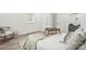 Serene bedroom with a bed, wooden tray, and natural light at 221 N Davis Ave, Newton, NC 28658