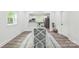 Elegant dining area with a blue-patterned table and chairs at 221 N Davis Ave, Newton, NC 28658