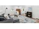 Bright living room featuring comfortable seating and a decorative rug at 221 N Davis Ave, Newton, NC 28658