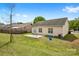 A spacious backyard with a concrete patio and well-maintained lawn offers outdoor living at 2659 Captains Watch Ne Rd, Kannapolis, NC 28083