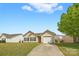 Charming single-story home featuring a well-maintained lawn and attached one car garage at 2659 Captains Watch Ne Rd, Kannapolis, NC 28083
