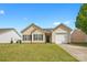Charming single-story home featuring a well-maintained lawn and attached one car garage at 2659 Captains Watch Ne Rd, Kannapolis, NC 28083