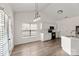 Bright and airy kitchen featuring an eat in breakfast area and stainless steel sink at 2659 Captains Watch Ne Rd, Kannapolis, NC 28083
