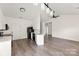 Spacious open-concept space featuring bright kitchen and modern appliances at 2659 Captains Watch Ne Rd, Kannapolis, NC 28083