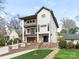 Beautiful three-story home featuring a striking brick design and professional landscaping at 2909 Hanson Dr, Charlotte, NC 28207