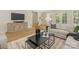 Comfortable living room features a washed wood console table and stylish decor, with hardwood flooring at 2909 Hanson Dr, Charlotte, NC 28207