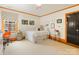 Bright bedroom with orange trim, neutral carpet, and a comfy twin bed at 2912 Wheelock Rd, Charlotte, NC 28211