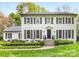 Charming two-story home with well-manicured lawn and classic architectural details at 2912 Wheelock Rd, Charlotte, NC 28211