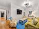Modern living room features comfortable seating, TV, contemporary lighting, and stylish decor at 2912 Wheelock Rd, Charlotte, NC 28211