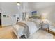 Bright and airy main bedroom with natural light and hardwood floors at 2912 Wheelock Rd, Charlotte, NC 28211