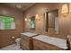 Charming bathroom with dual vanities, wooden cabinets, and hexagonal tile floors at 2915 Cross Country Rd, Charlotte, NC 28270