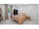 This bedroom offers a light space, a bookshelf, and access to a window with great natural light at 2915 Cross Country Rd, Charlotte, NC 28270