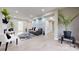 Well-lit living room featuring a stylish sofa, hardwood floors, and contemporary accents at 314 Bass Ln, Charlotte, NC 28270
