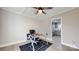 Bright room featuring modern décor, a contemporary desk, and a view into the adjacent kitchen at 314 Bass Ln, Charlotte, NC 28270