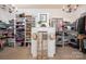 Spacious walk-in closet with custom shelving, ample storage, and elegant lighting, perfect for organizing wardrobe and accessories at 3160 Ashwood Park Dr, Belmont, NC 28012