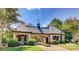 Beautiful stone entry gate house providing privacy and elegance to the community at 3160 Ashwood Park Dr, Belmont, NC 28012