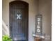 Up close image of the home's elegant and rustic wood front door at 3160 Ashwood Park Dr, Belmont, NC 28012