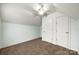 Bedroom features neutral walls, plush carpeting, and dual closets at 3320 Alderknoll Ct, Charlotte, NC 28216