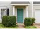 A close up view of the front door and address of the home at 3320 Alderknoll Ct, Charlotte, NC 28216