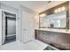 Bathroom featuring a double vanity with modern fixtures and a large mirror at 3383 Norwich Rd, Fort Mill, SC 29715