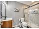 Modern bathroom with tiled walk-in shower, wood vanity, and stylish fixtures at 3383 Norwich Rd, Fort Mill, SC 29715