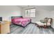 Cozy bedroom features a large window for natural light and comfortable decor at 3383 Norwich Rd, Fort Mill, SC 29715
