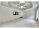 Large bedroom showcasing a tray ceiling, neutral color palette, and natural light at 3383 Norwich Rd, Fort Mill, SC 29715