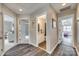 Hallway with views of bedroom and bathroom; features modern lighting and flooring at 3383 Norwich Rd, Fort Mill, SC 29715