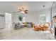 Spacious living room featuring natural light, comfortable seating, and stylish decor at 3383 Norwich Rd, Fort Mill, SC 29715